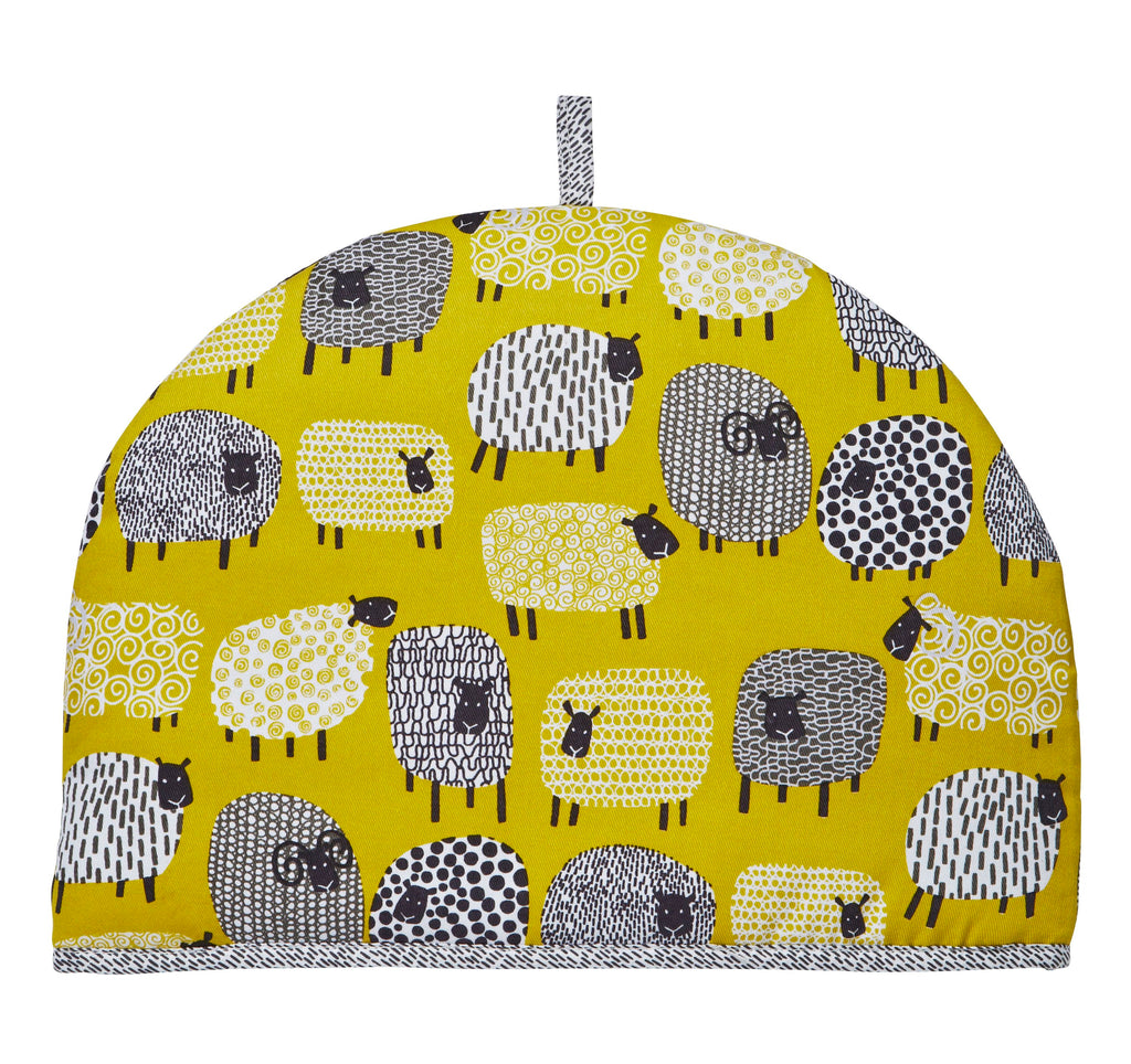 Mrs Doyle's Sheep Tea Cosy features lots of quirky Dotty Sheep illustrations on a mustard background