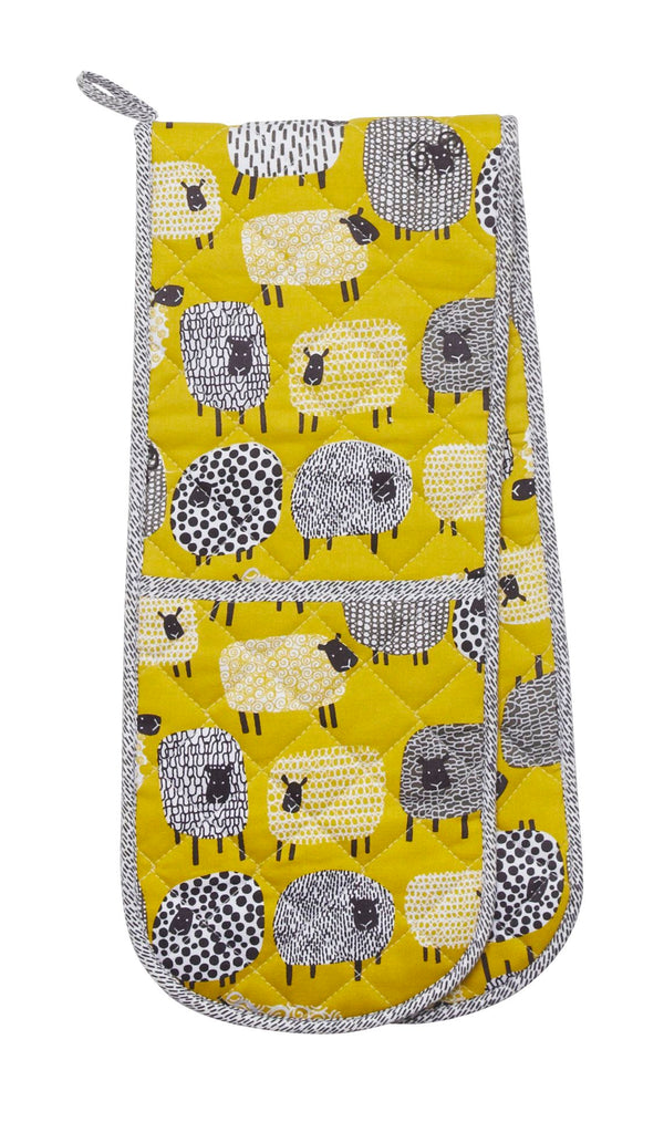  Mrs Doyle's Sheep Oven Gloves has a dotty sheep design with sheep illustrations on mustard background, this is a double glove It's made from 100% cotton with polywadding filling for protection.